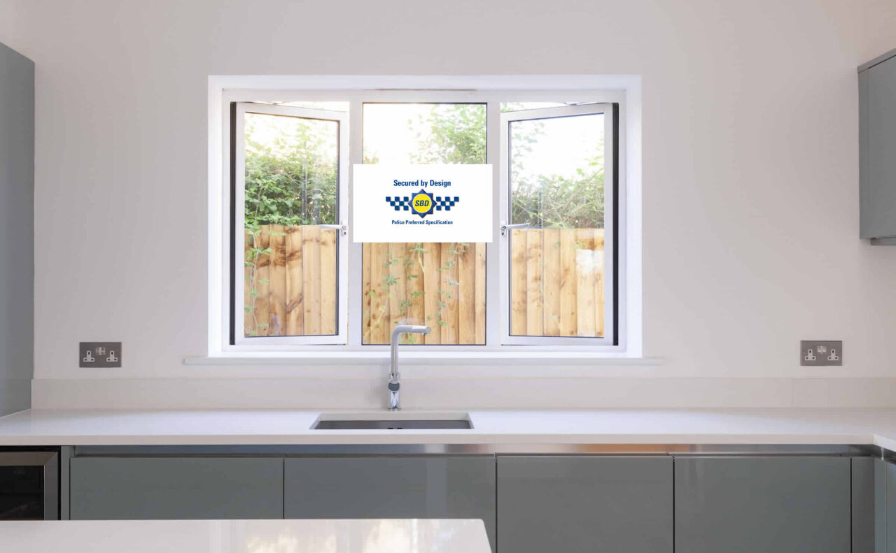 White PVCu casement window above a kitchen sink